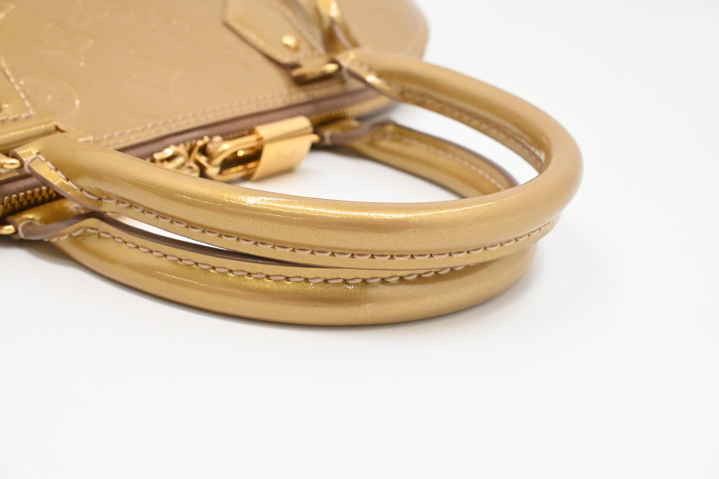 Louis Vuitton Alma GM in Beige Poudre Vernis Leather