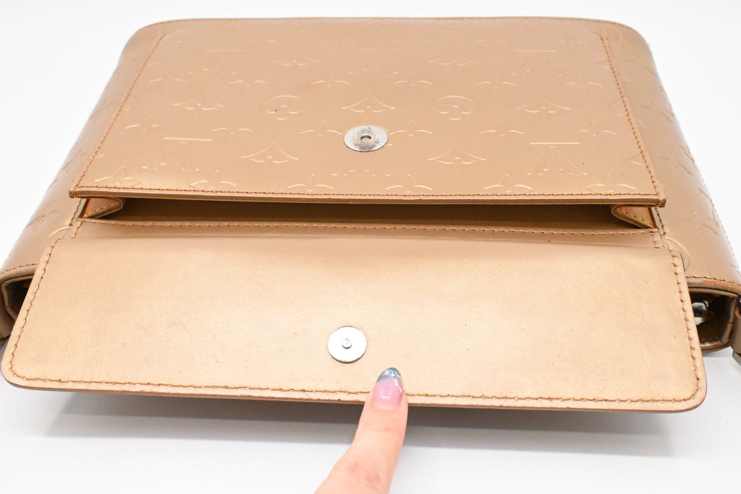 Louis Vuitton Allston in Champagne Gold Matte Leather