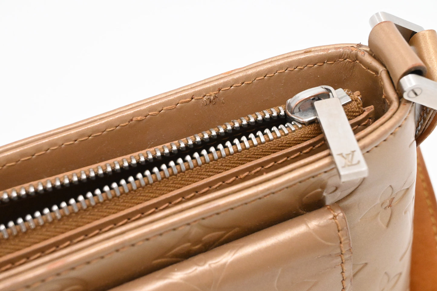 Louis Vuitton Allston in Champagne Gold Matte Leather