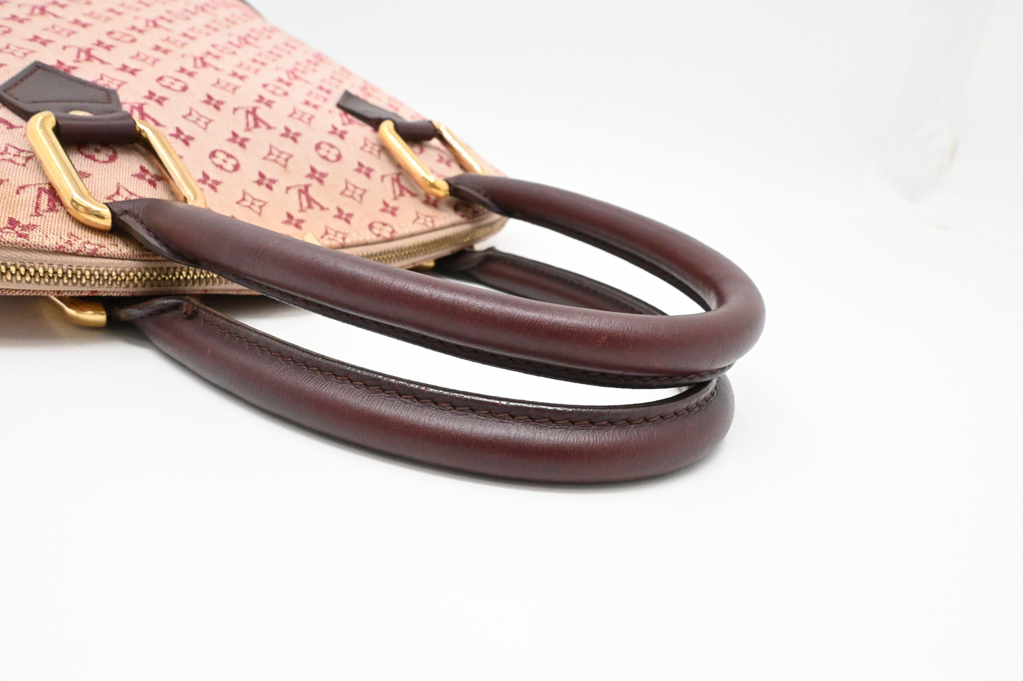 Louis Vuitton Alma Haut in Cerise Minilin Canvas