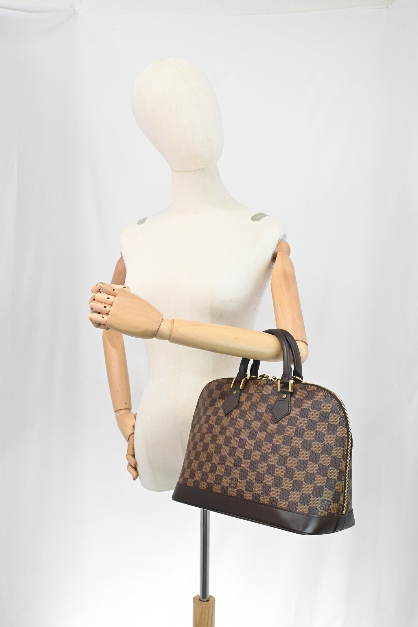 Louis Vuitton Alma PM in Damier Ebene Canvas