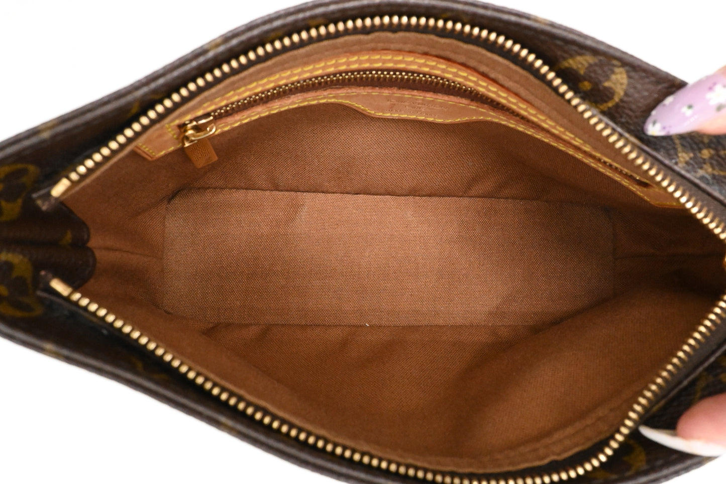 Louis Vuitton Trotteur in Monogram Canvas