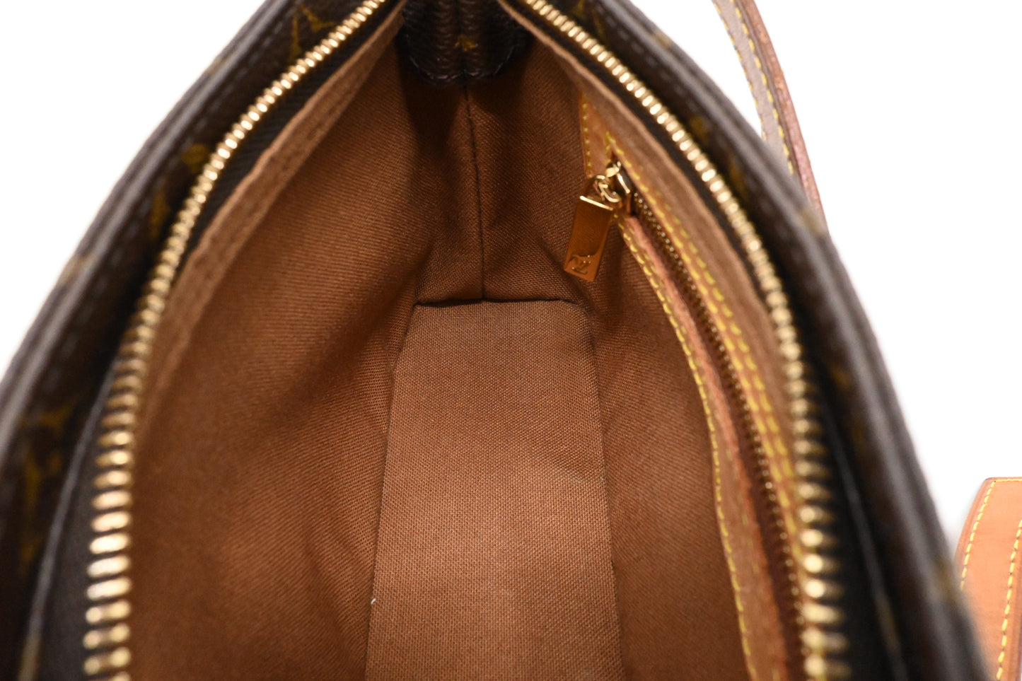 Louis Vuitton Trotteur in Monogram Canvas
