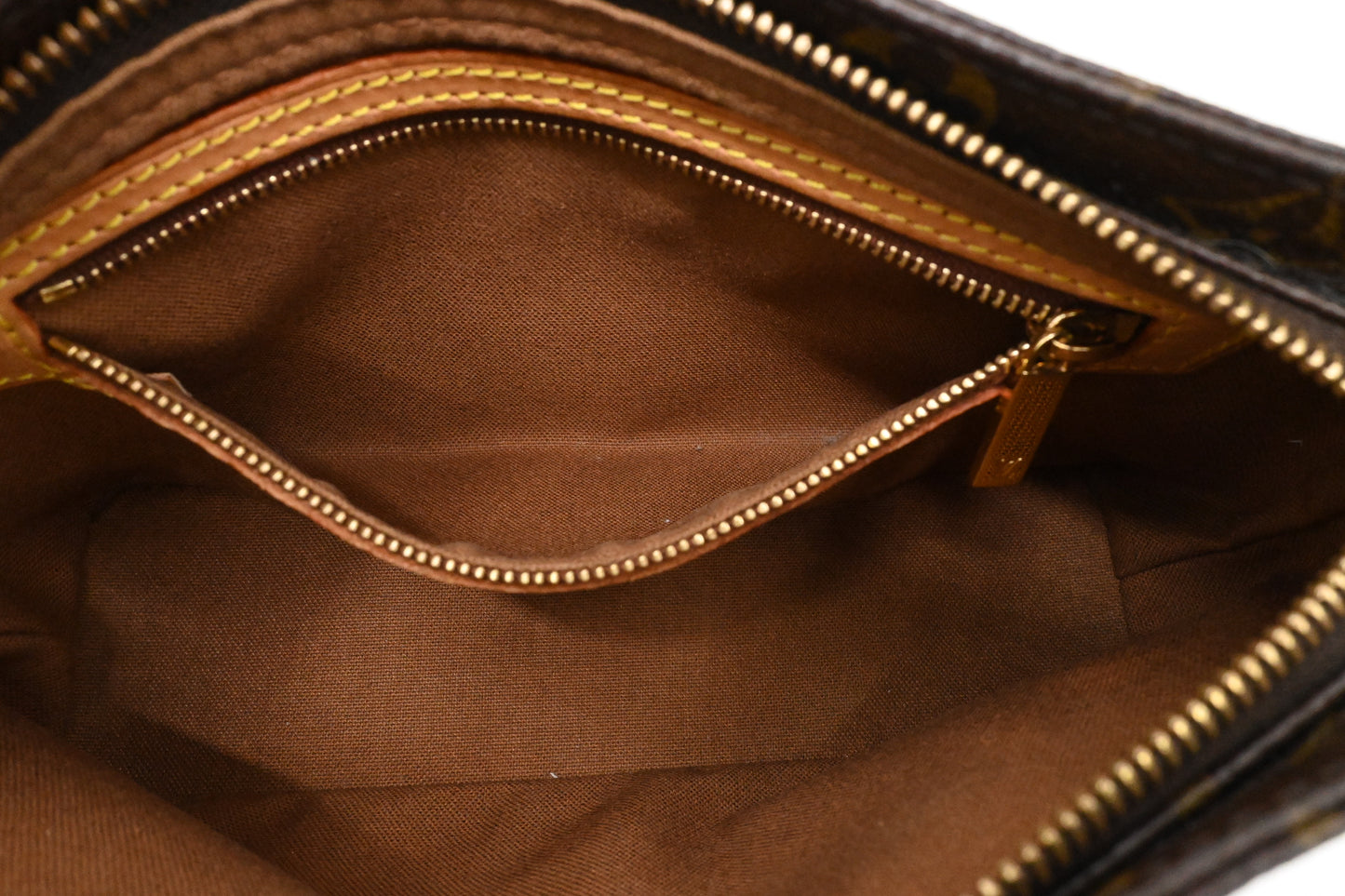Louis Vuitton Trotteur in Monogram Canvas
