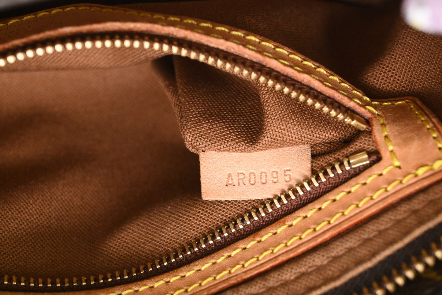 Louis Vuitton Trotteur in Monogram Canvas