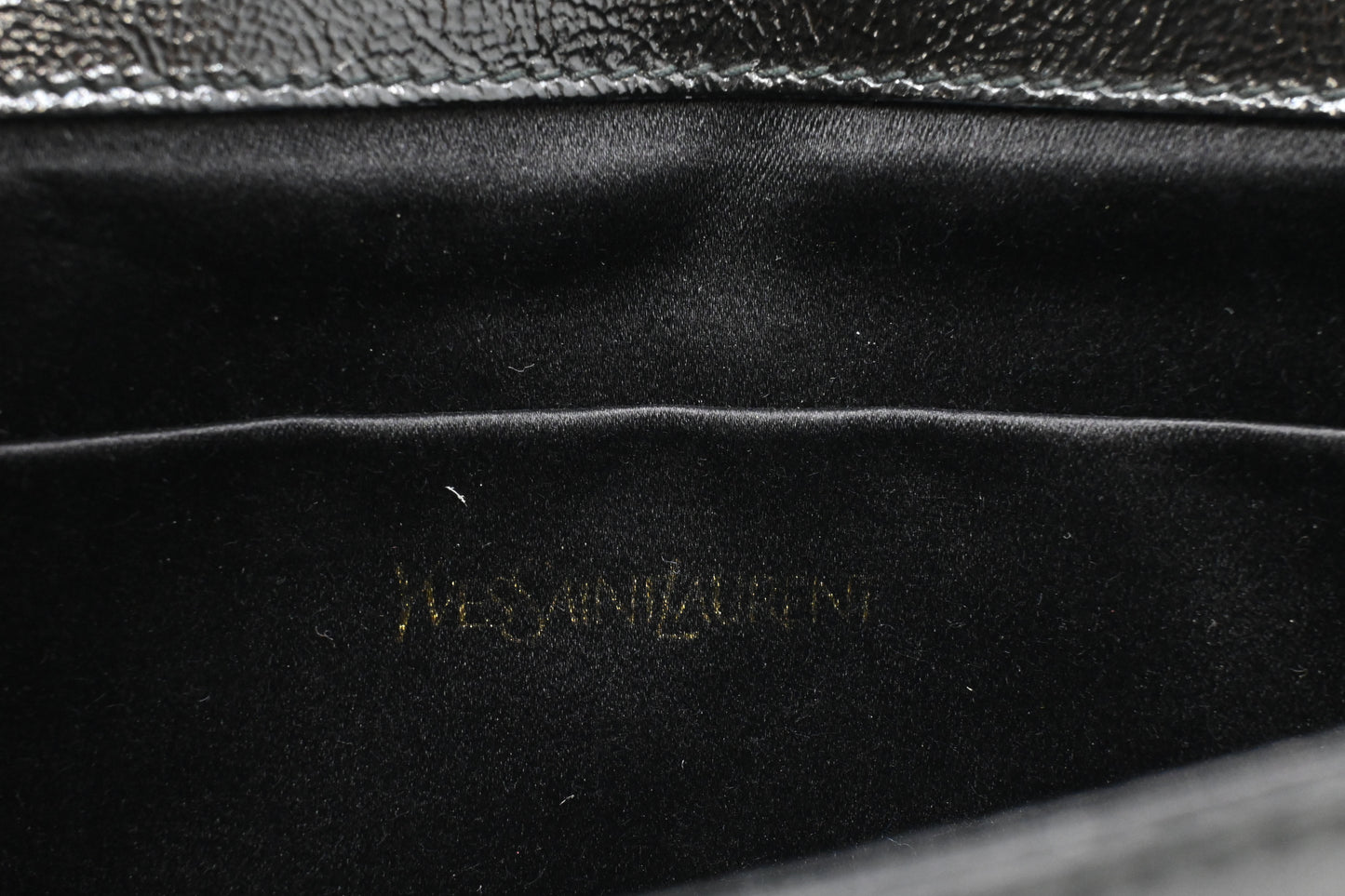 YSL Saint Laurent Clutch in Black Patent Leather