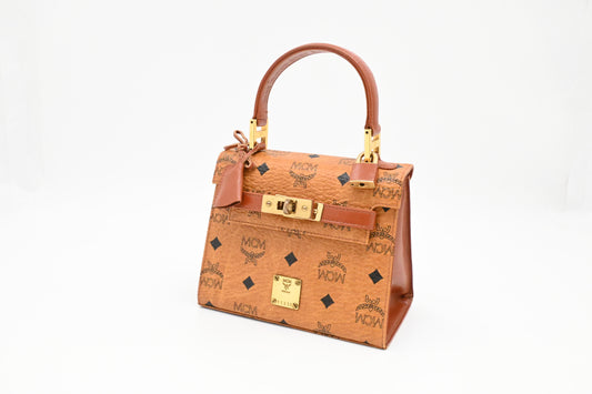 MCM Mini Kelly in Cognac Visetos Canvas