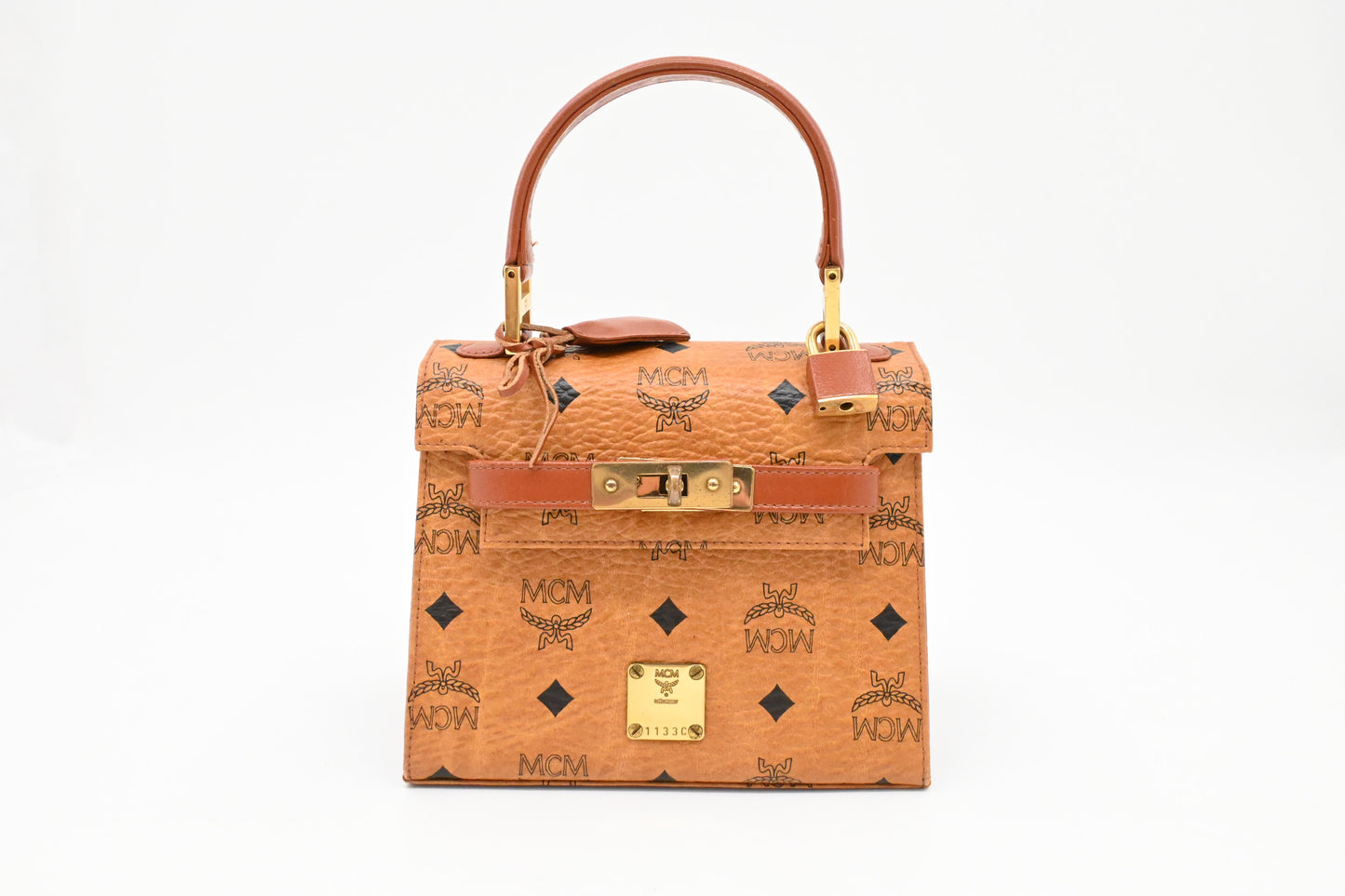 MCM Mini Kelly in Cognac Visetos Canvas