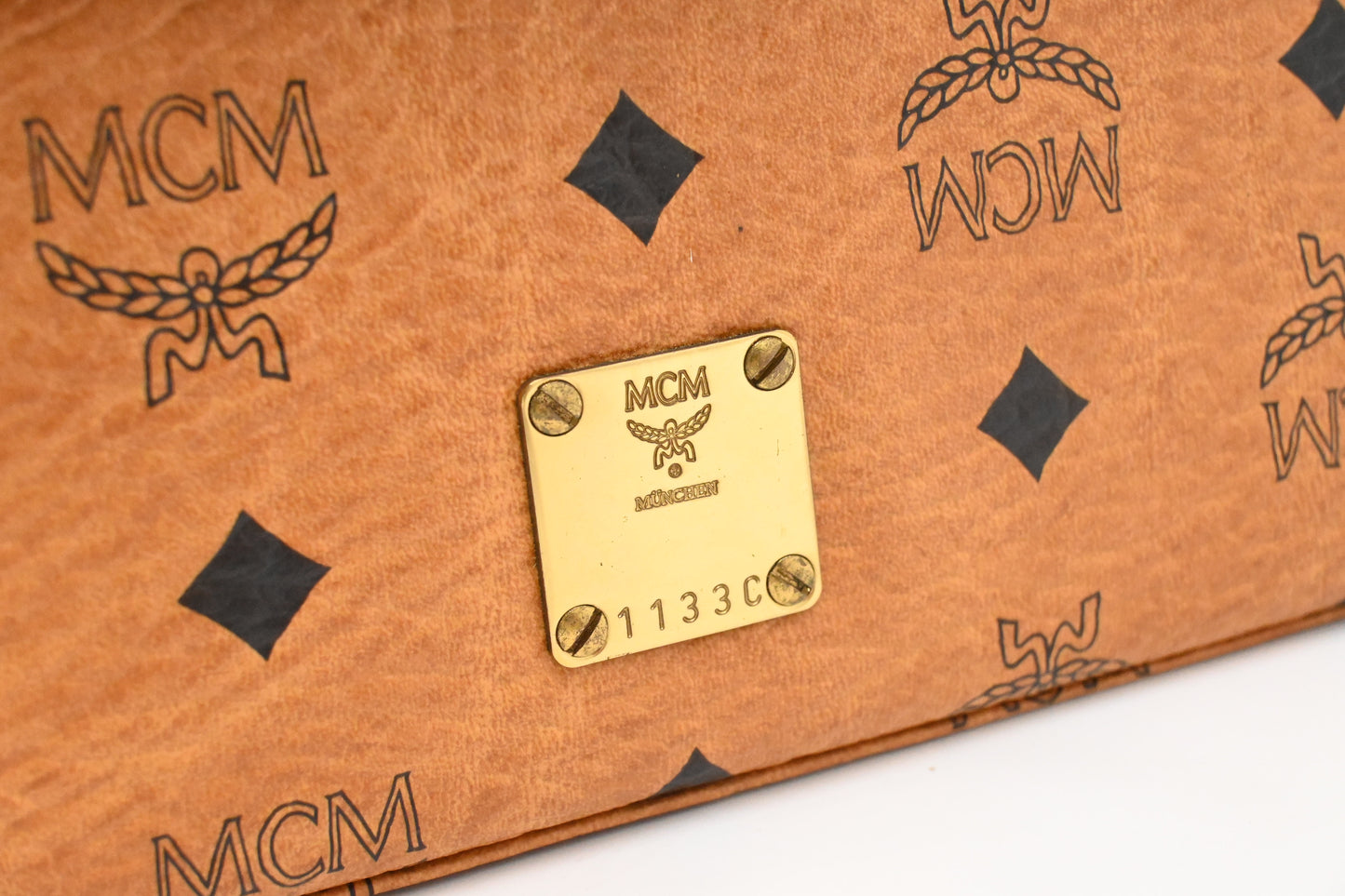 MCM Mini Kelly in Cognac Visetos Canvas