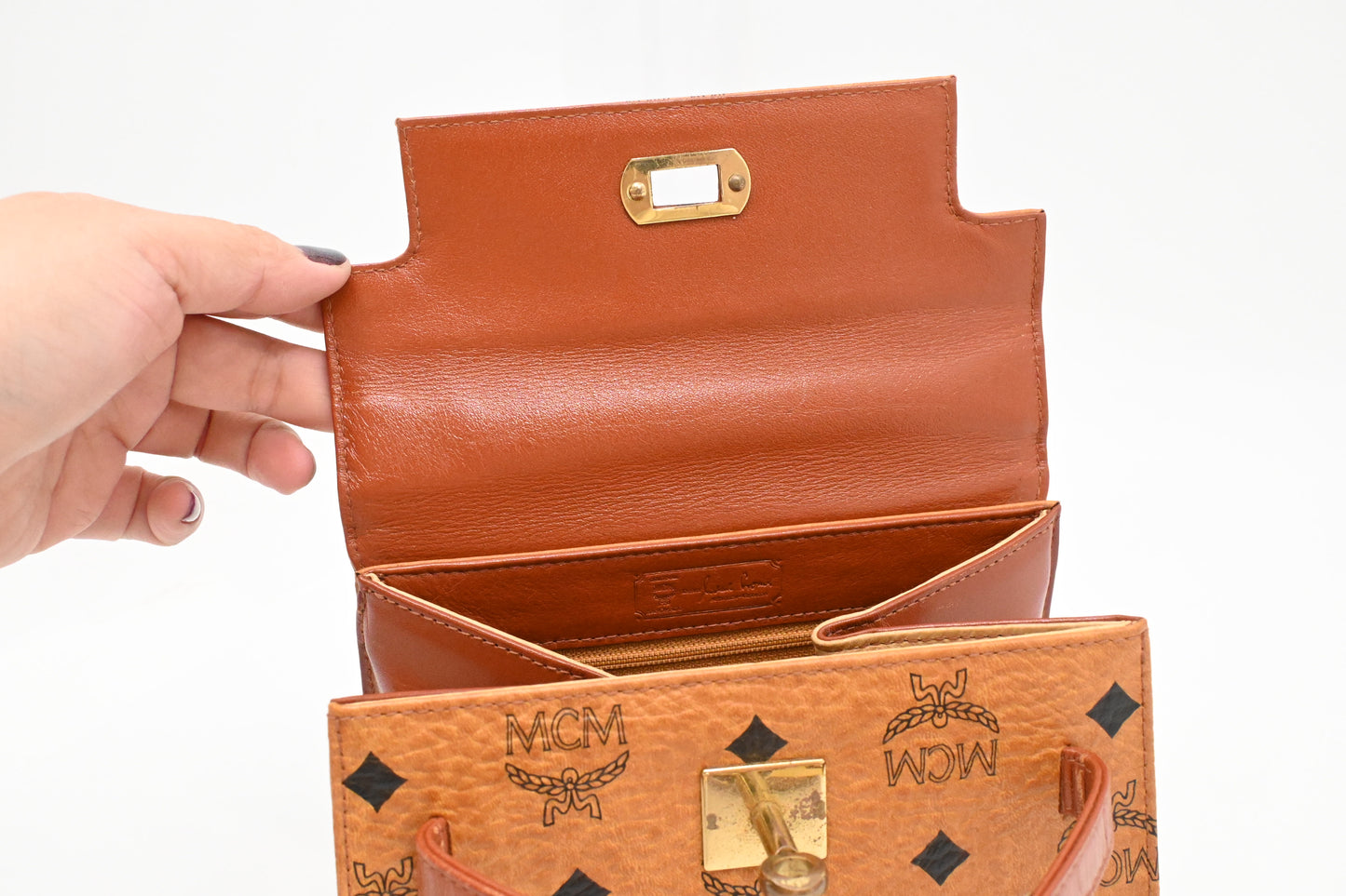 MCM Mini Kelly in Cognac Visetos Canvas