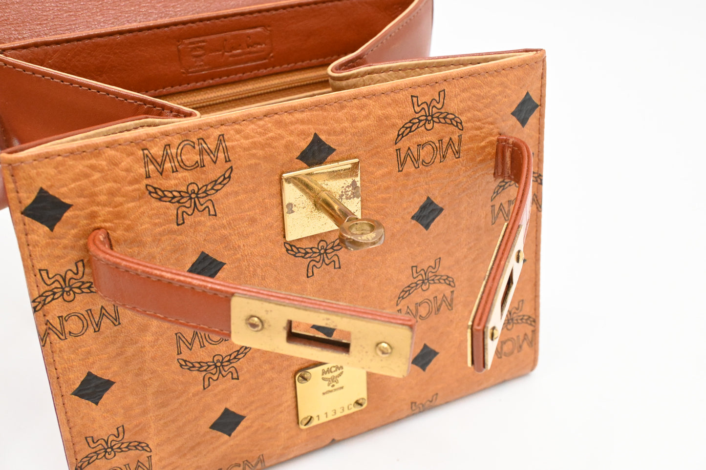 MCM Mini Kelly in Cognac Visetos Canvas