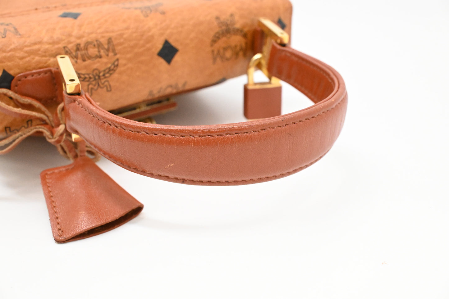 MCM Mini Kelly in Cognac Visetos Canvas