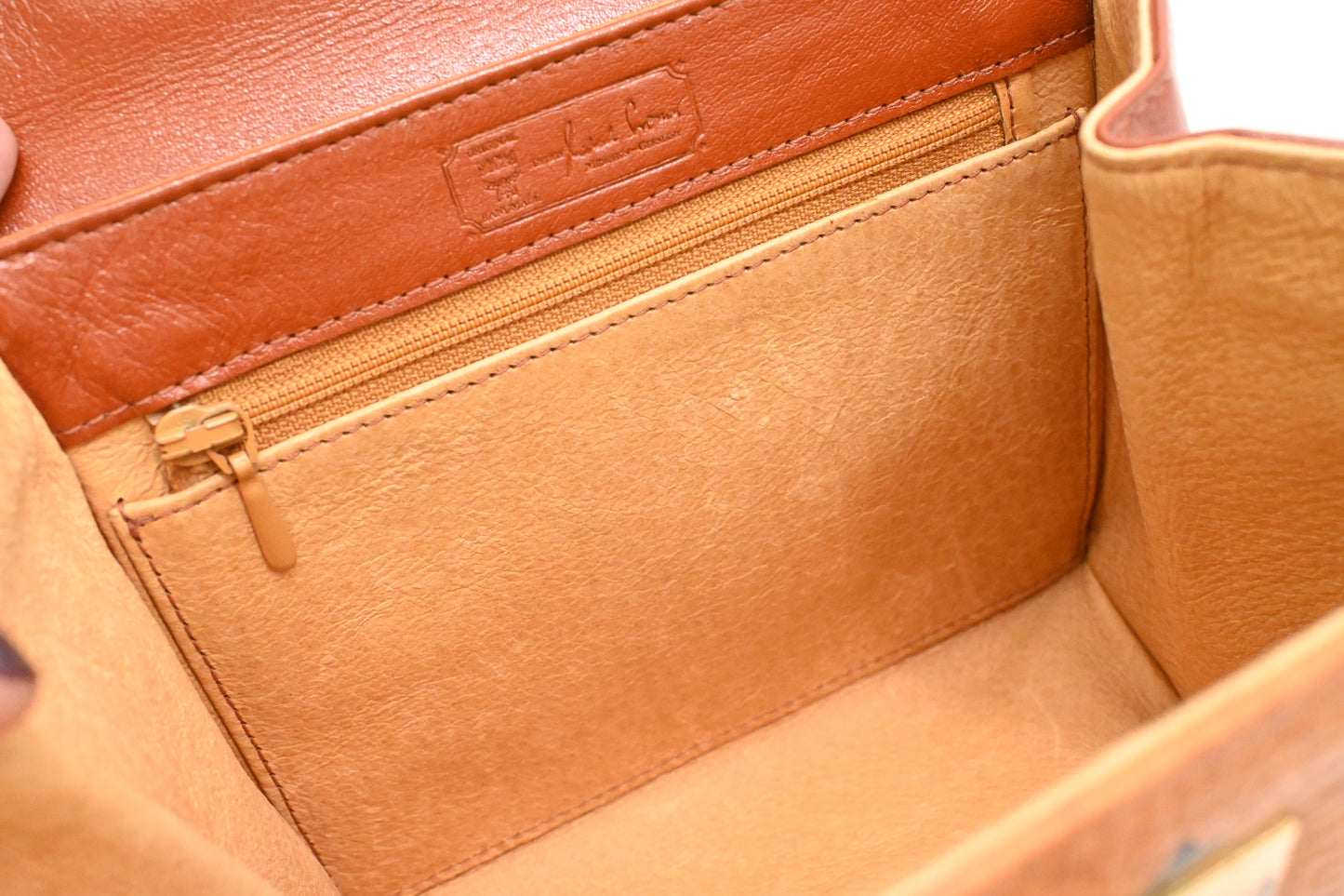 MCM Mini Kelly in Cognac Visetos Canvas