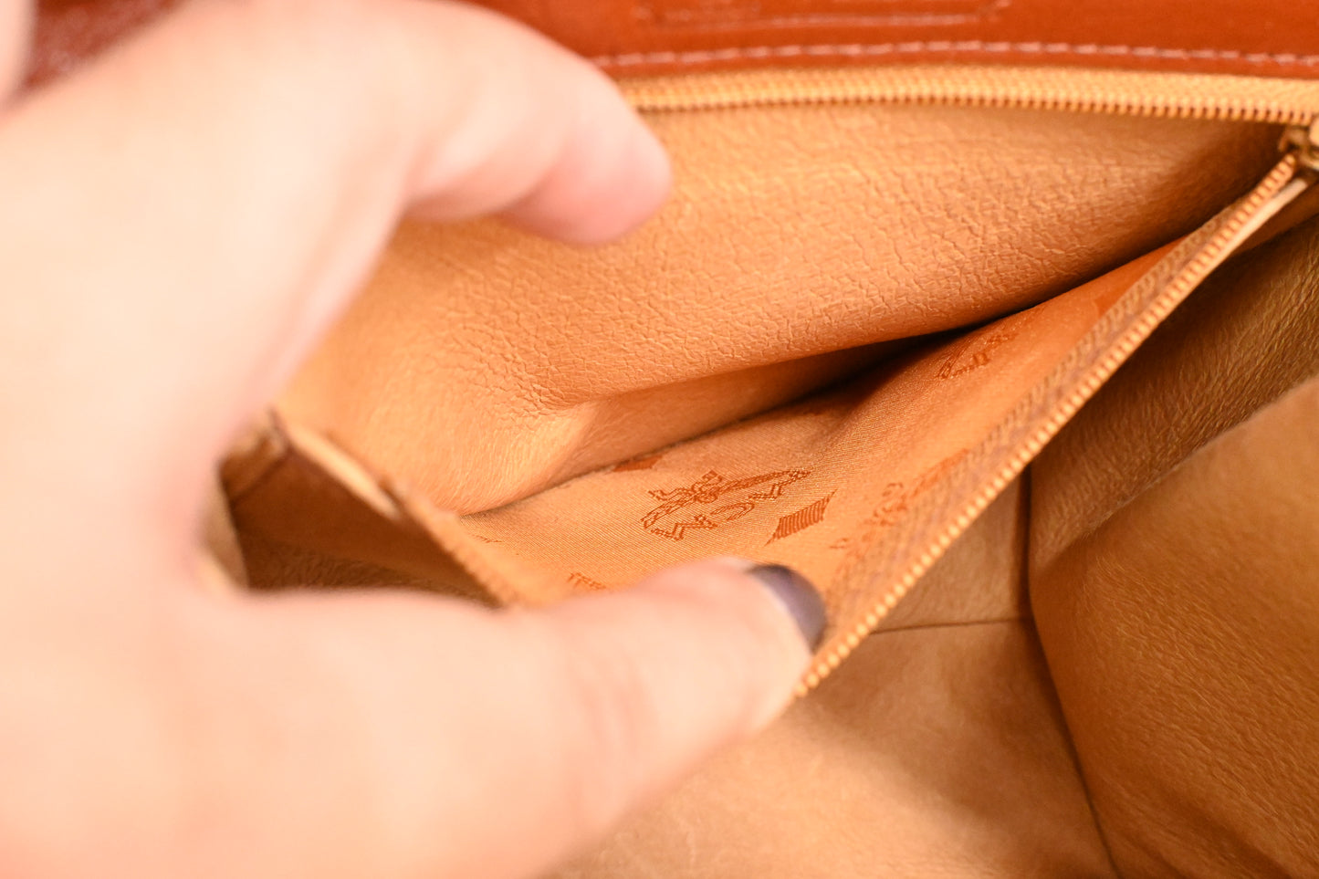 MCM Mini Kelly in Cognac Visetos Canvas