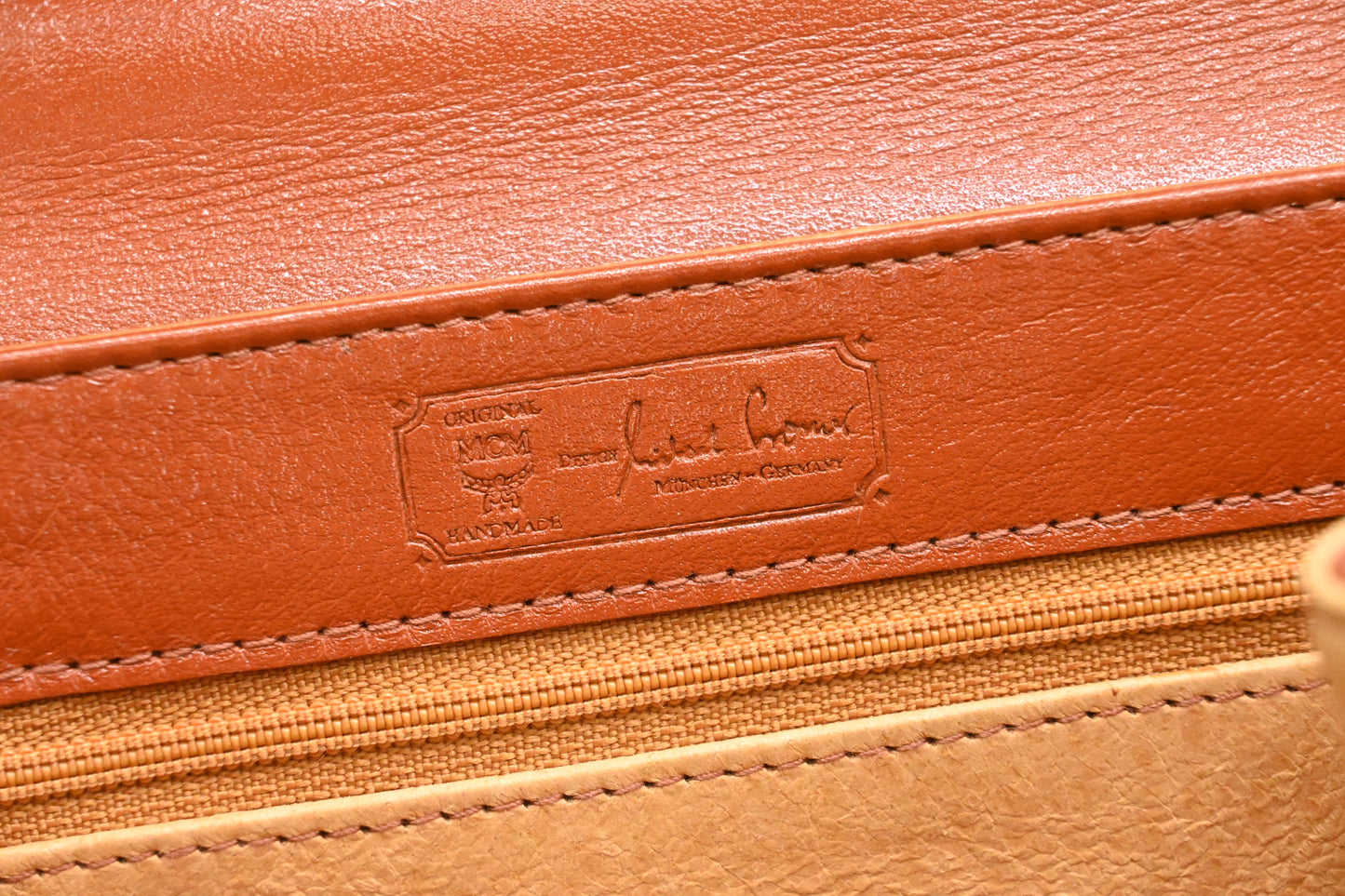 MCM Mini Kelly in Cognac Visetos Canvas
