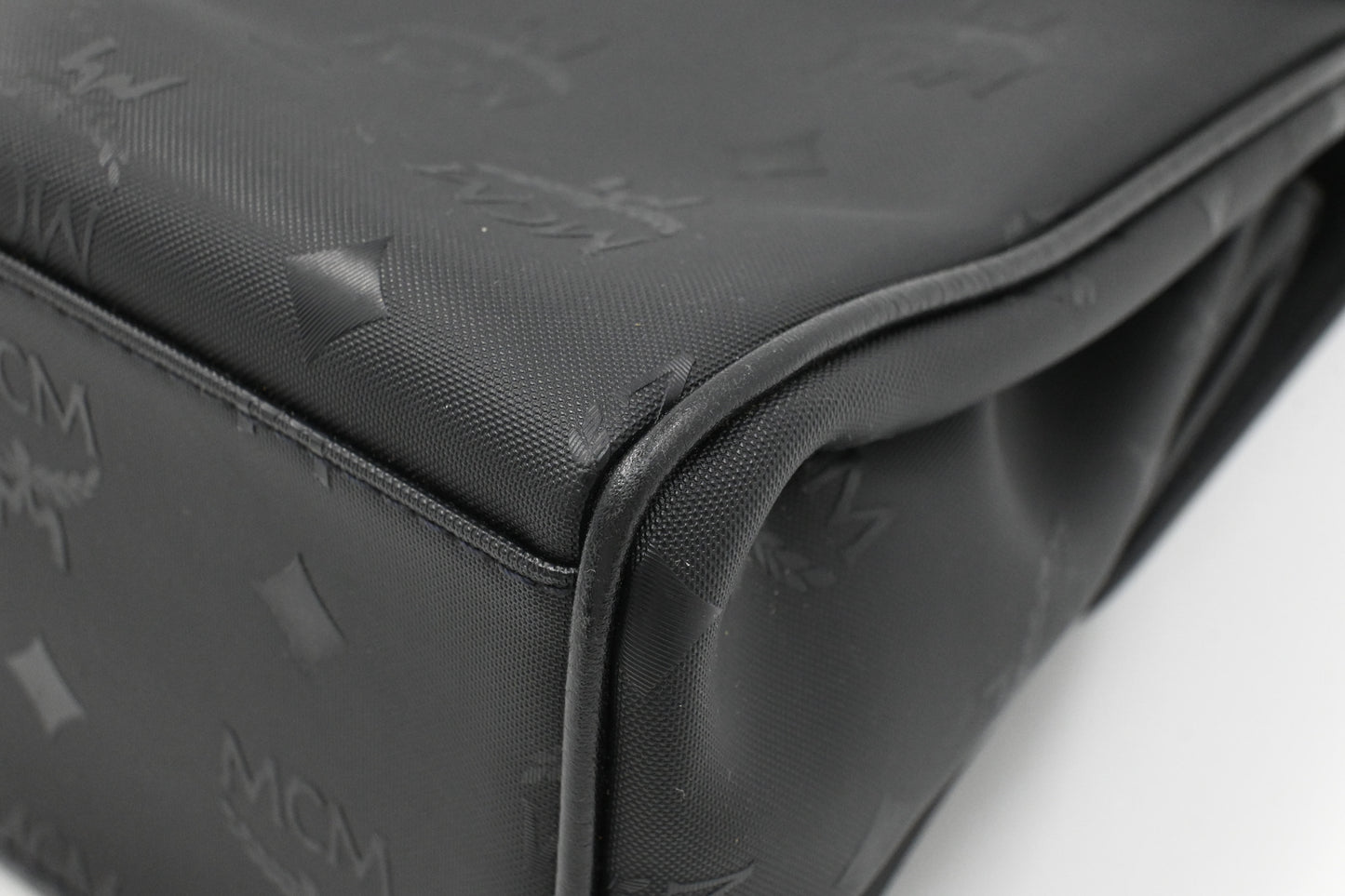 MCM Top Handle Bag in Black Coated Canvas
