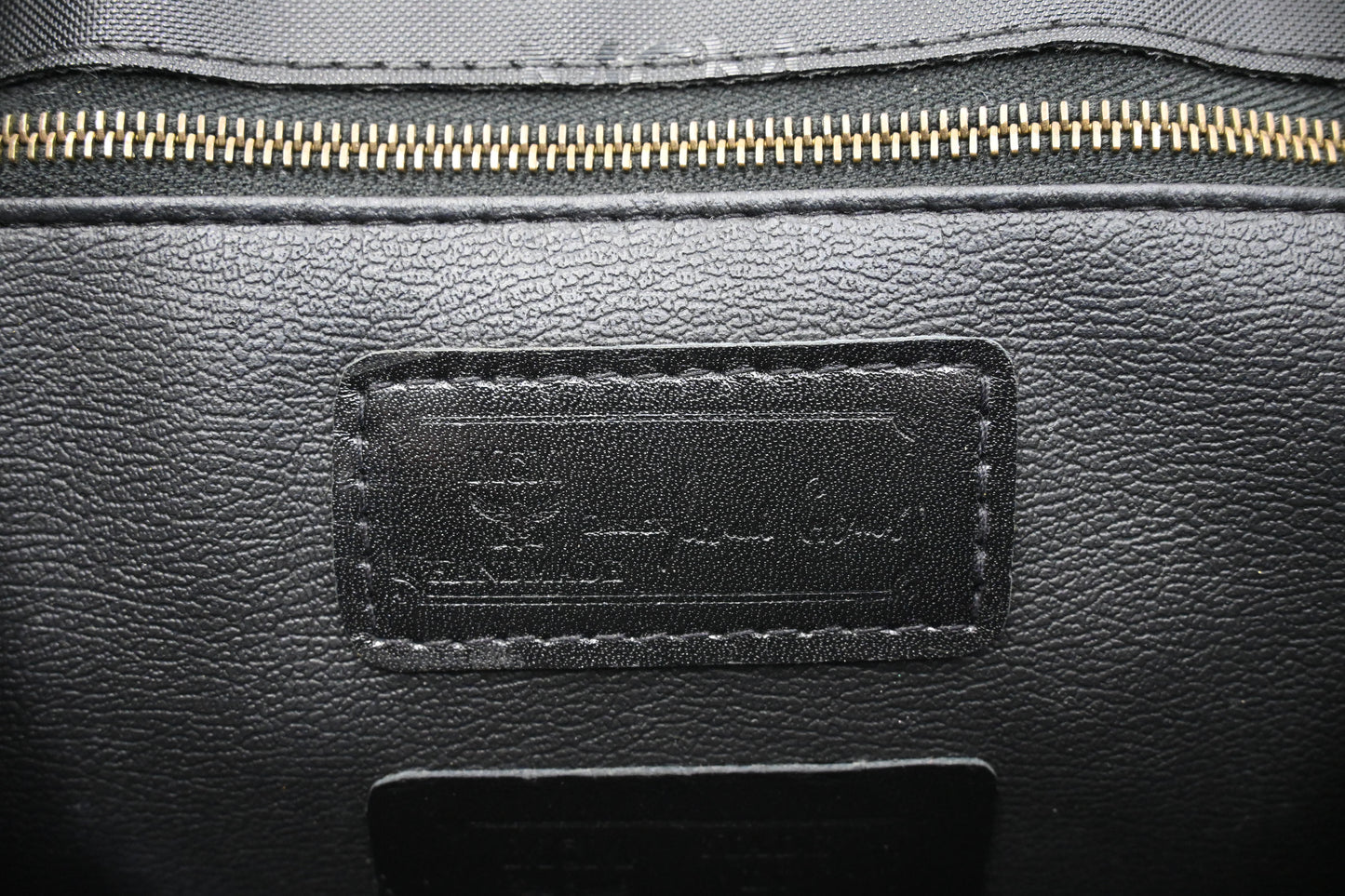 MCM Top Handle Bag in Black Coated Canvas