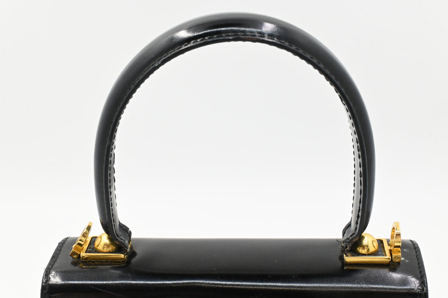 Ferragamo Top Handle Bag in Black Patent Leather