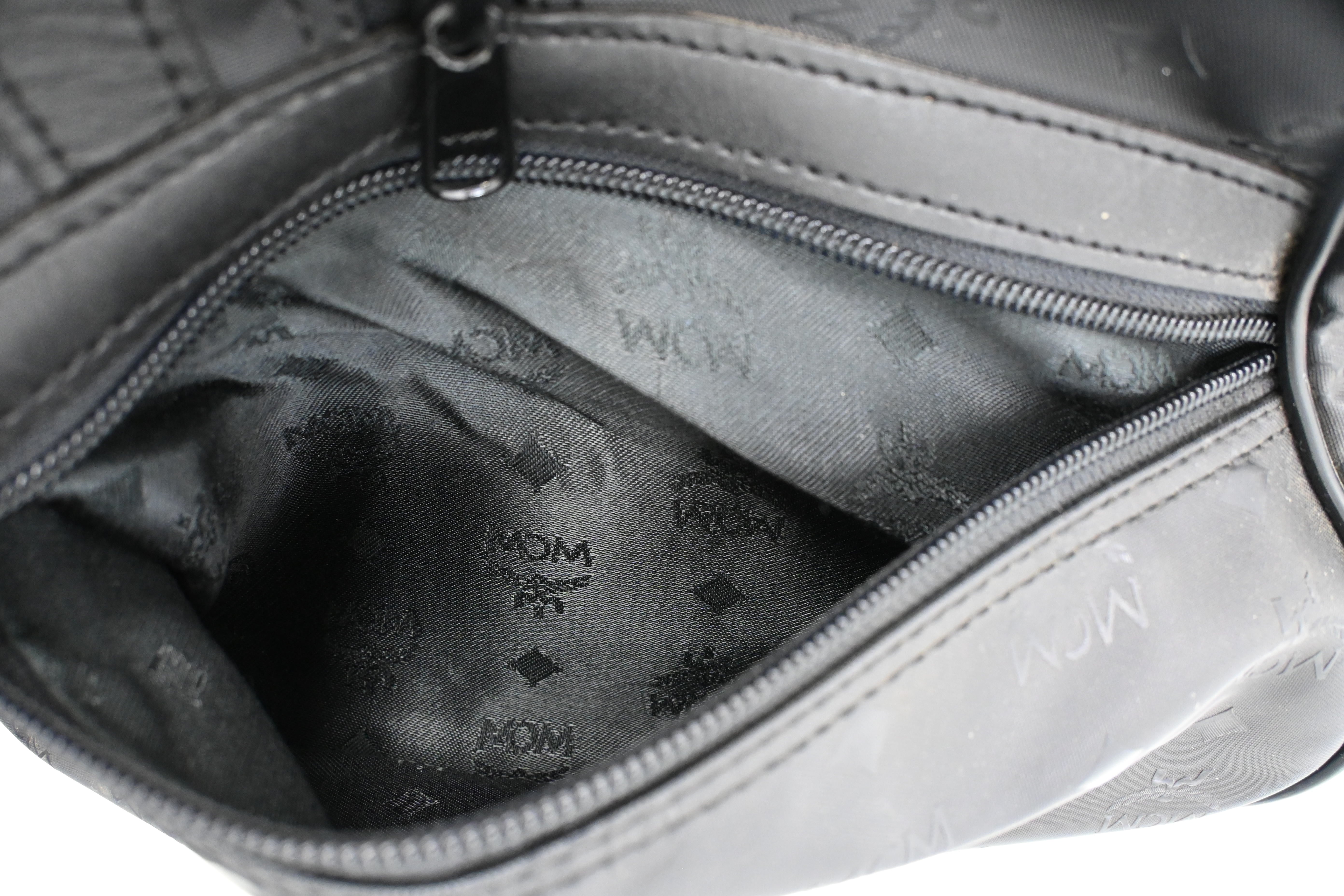 MCM Travel Bag in Black Coated Canvas – Weekly Lux Drop