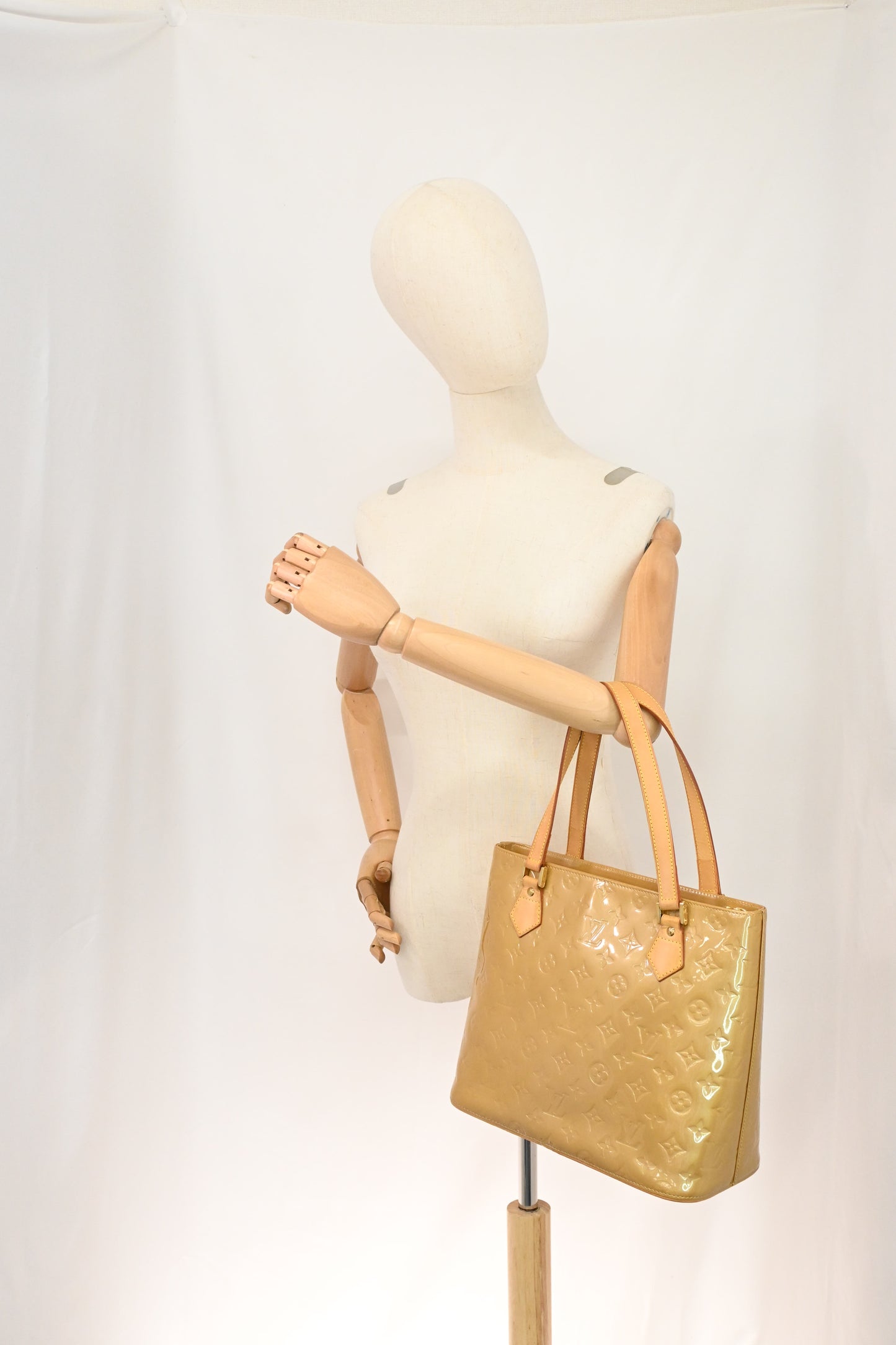 Louis Vuitton Houston in Beige Vernis Leather