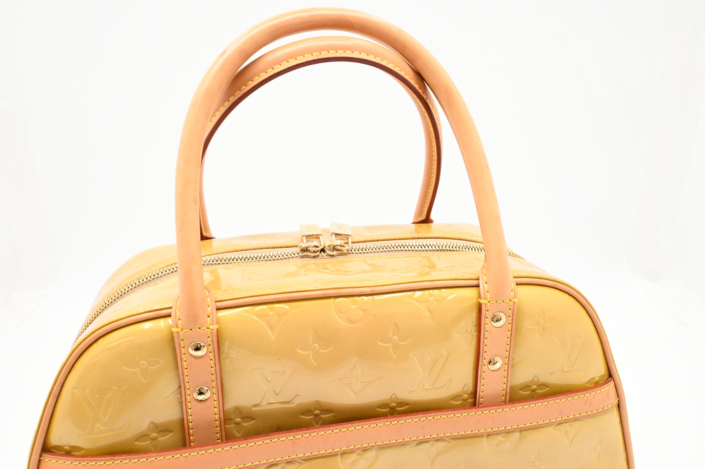 Louis Vuitton Thompkins Square in Yellow Vernis Leather