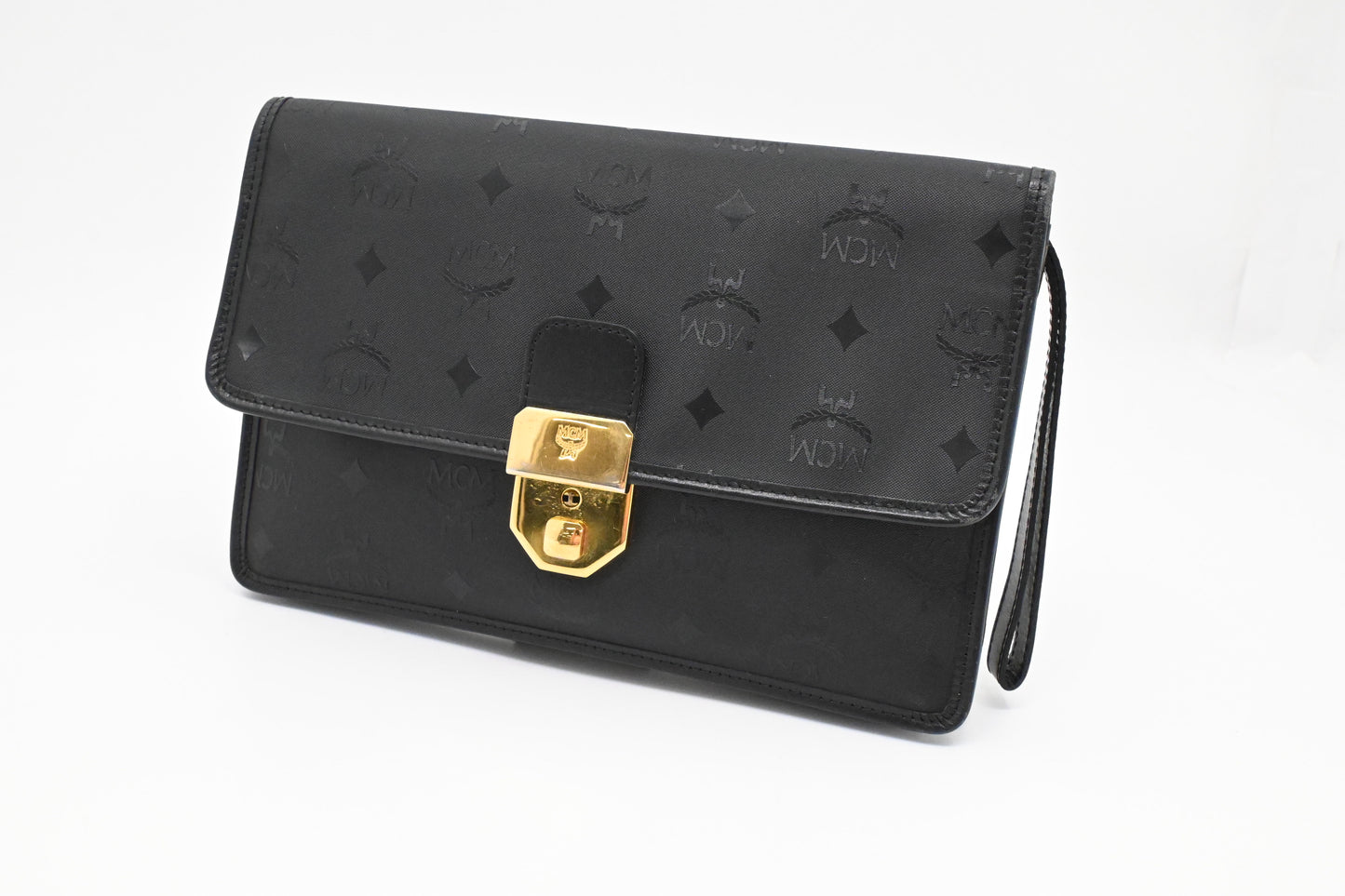 MCM Clutch Bag in Black Visetos Canvas