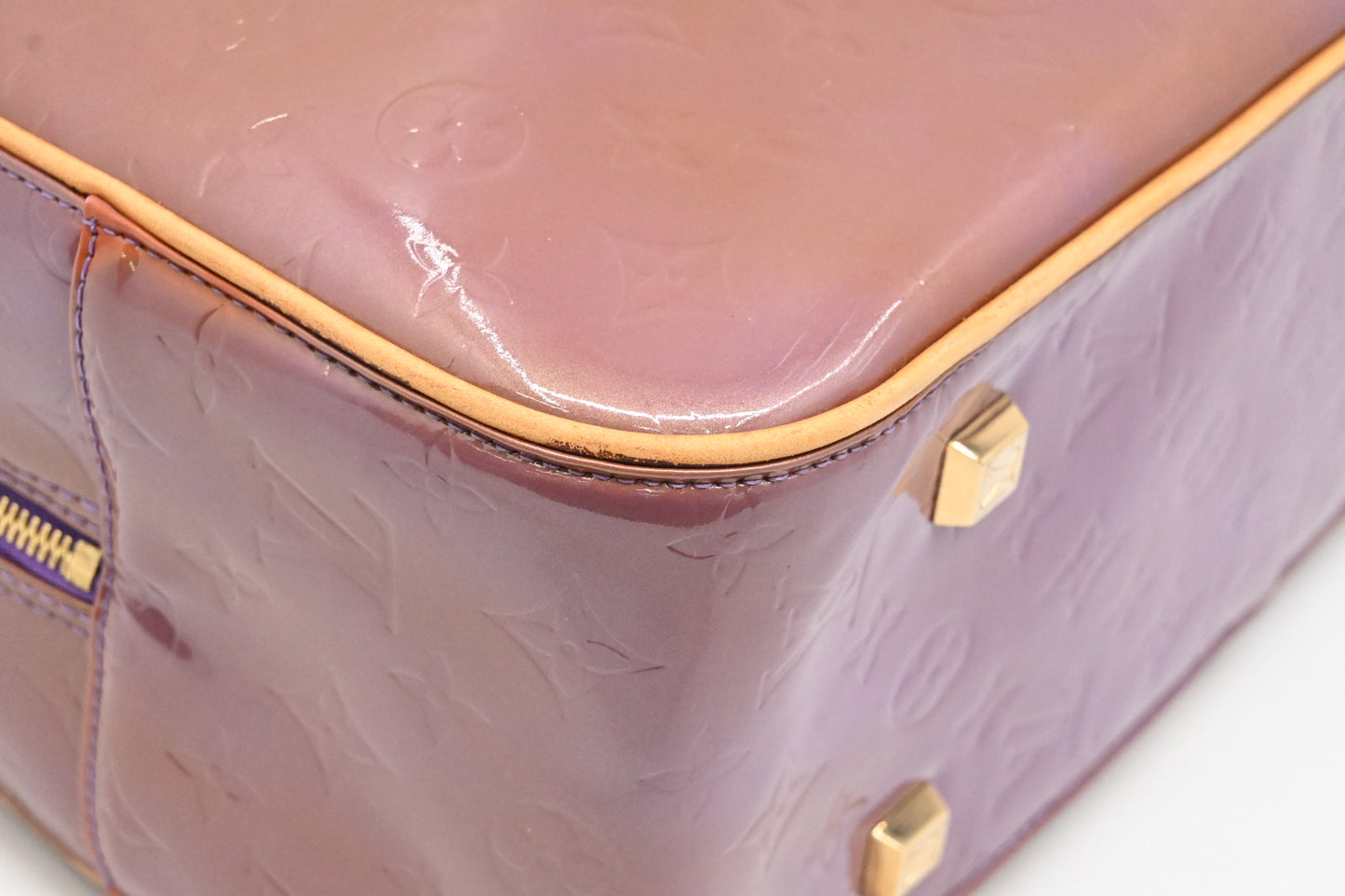 Louis Vuitton Sutton in Purple Vernis Leather