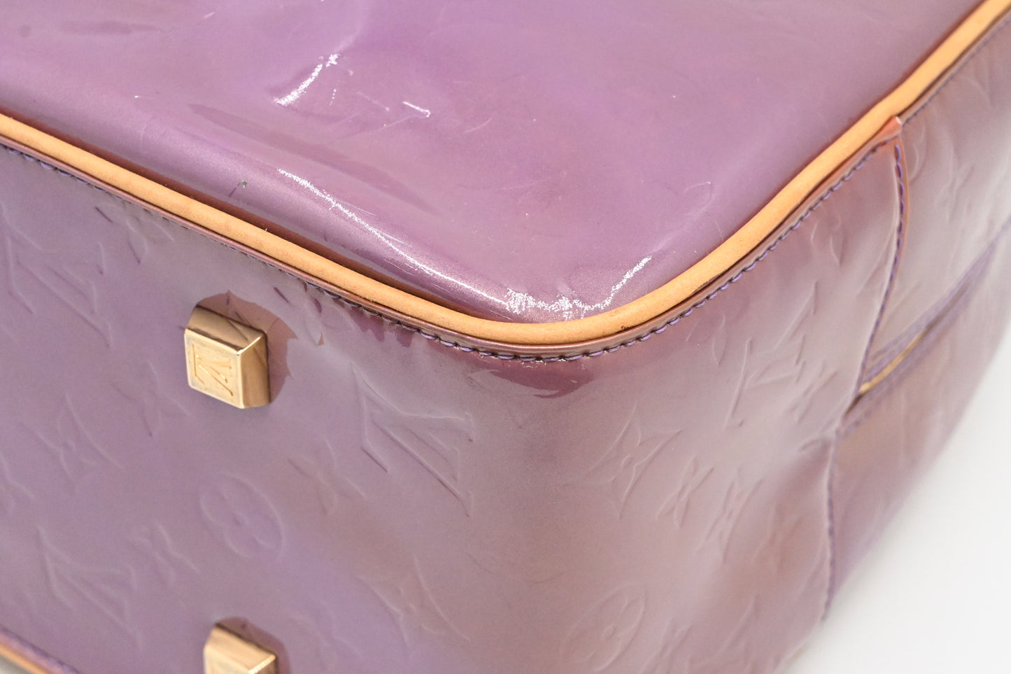 Louis Vuitton Sutton in Purple Vernis Leather