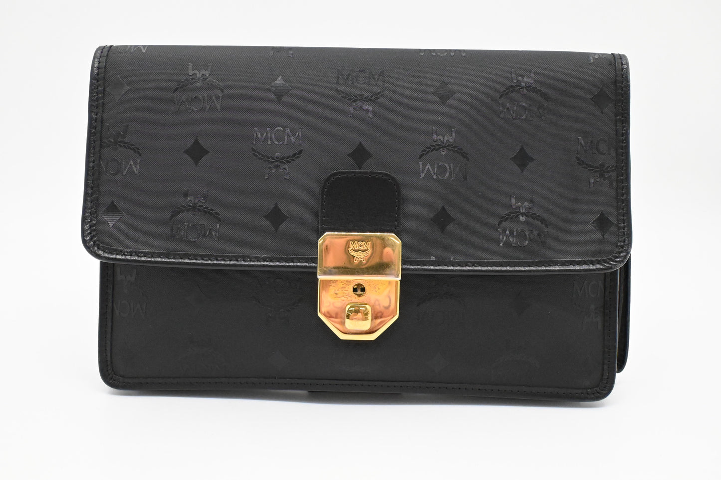 MCM Clutch Bag in Black Visetos Canvas