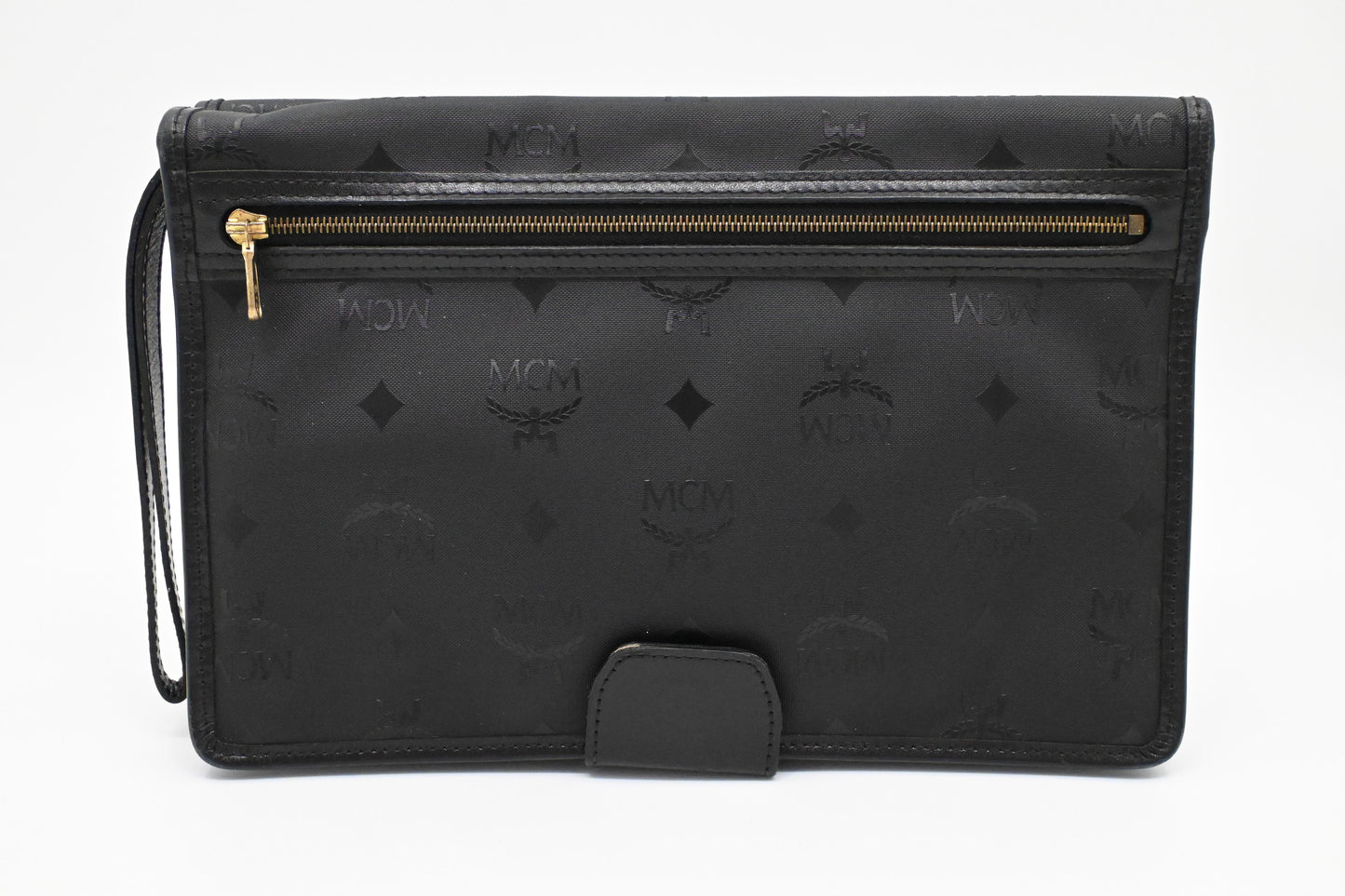 MCM Clutch Bag in Black Visetos Canvas