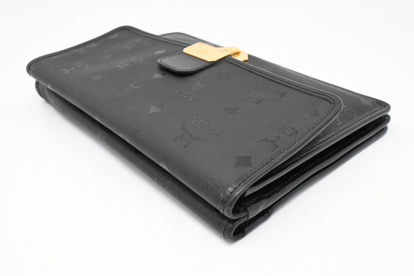 MCM Clutch Bag in Black Visetos Canvas