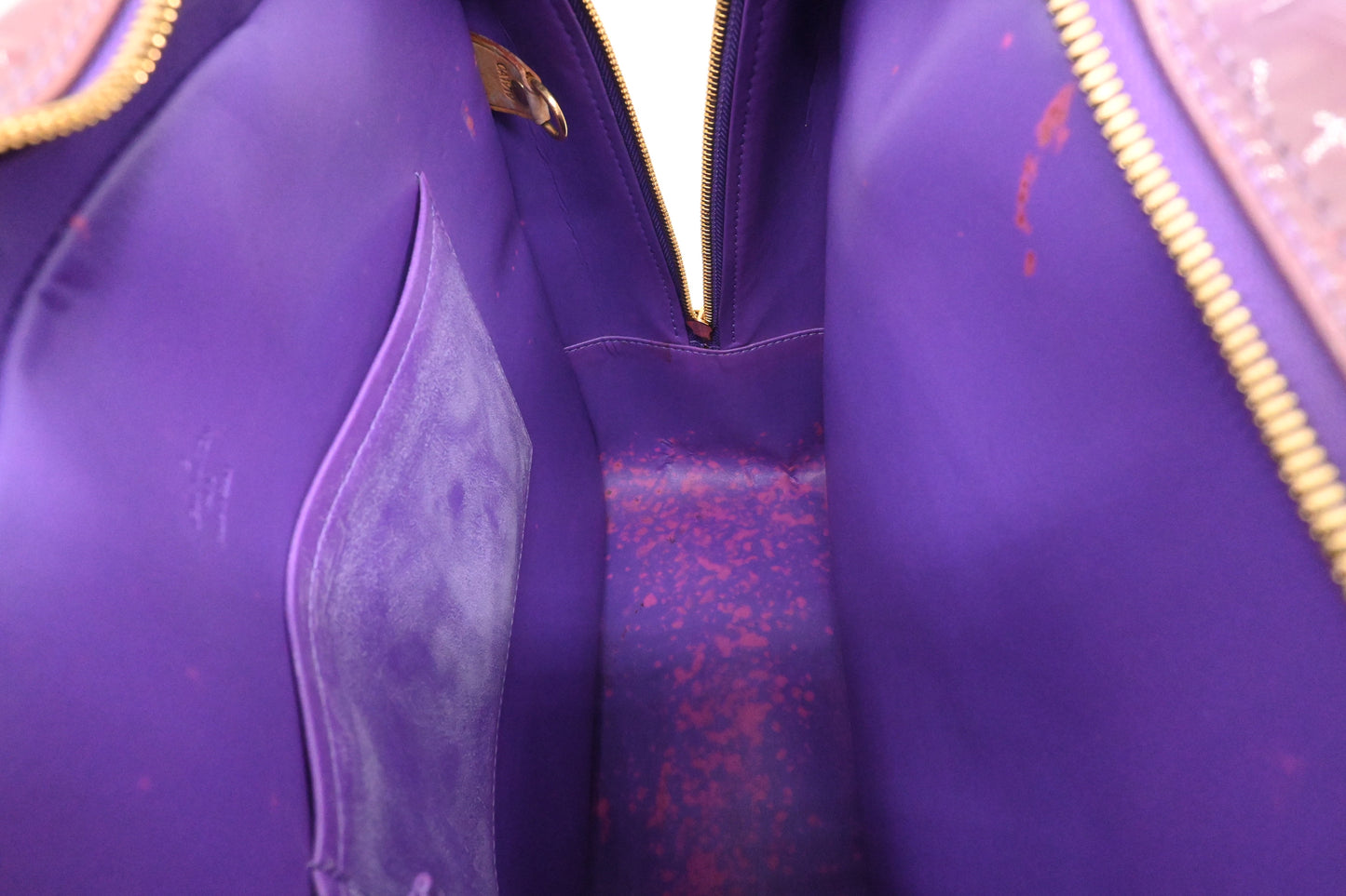 Louis Vuitton Sutton in Purple Vernis Leather