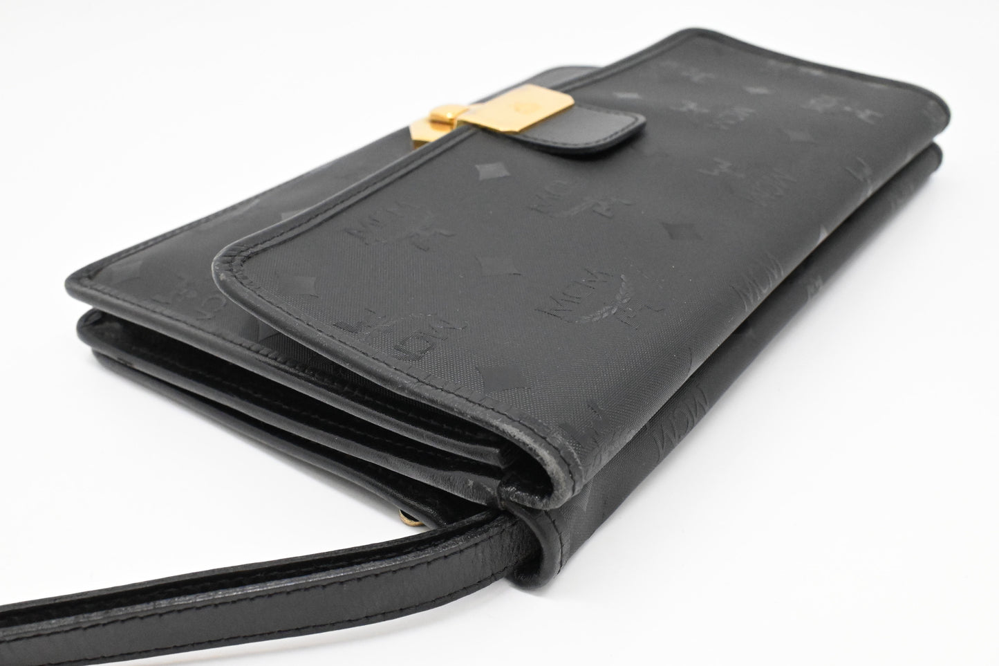 MCM Clutch Bag in Black Visetos Canvas