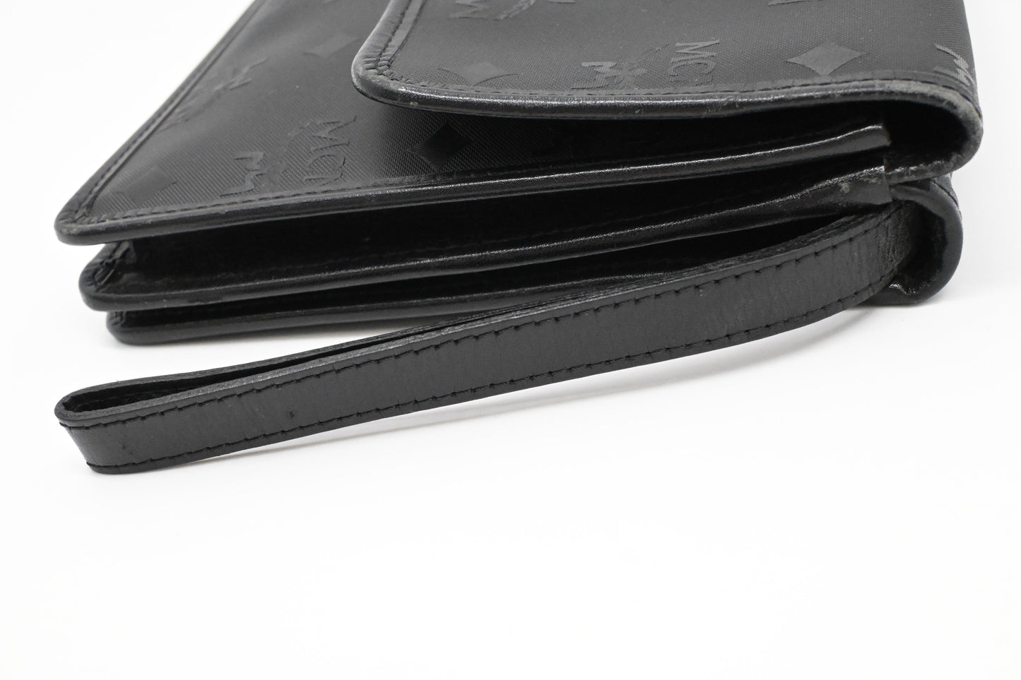 MCM Clutch Bag in Black Visetos Canvas
