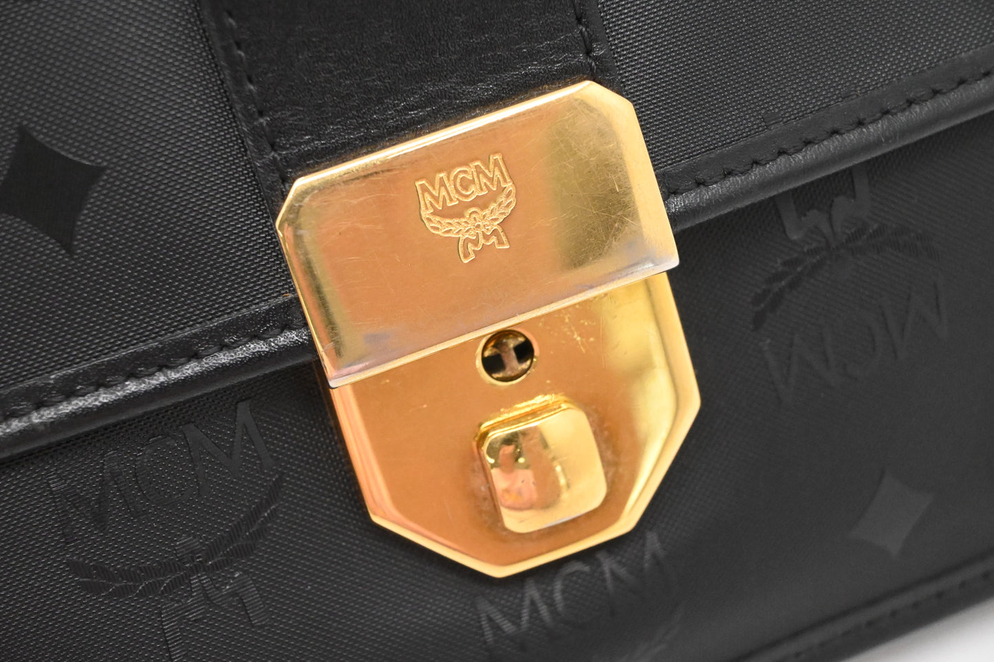 MCM Clutch Bag in Black Visetos Canvas
