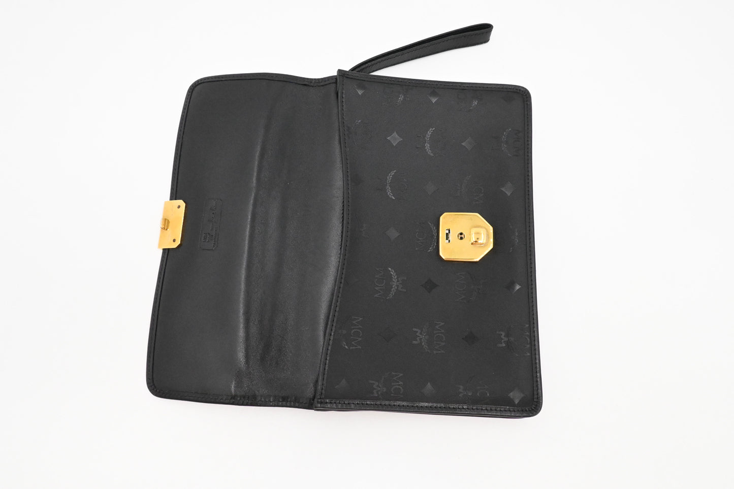 MCM Clutch Bag in Black Visetos Canvas