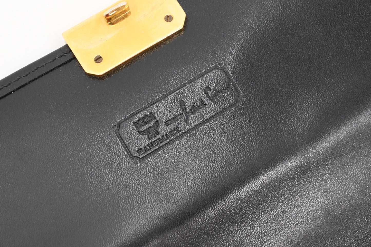 MCM Clutch Bag in Black Visetos Canvas