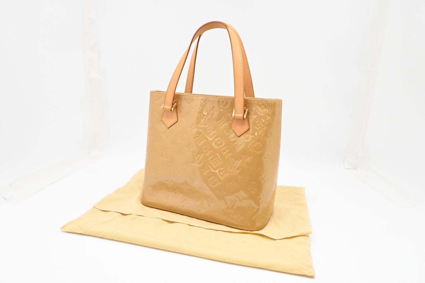 Louis Vuitton Houston in Beige Vernis Leather