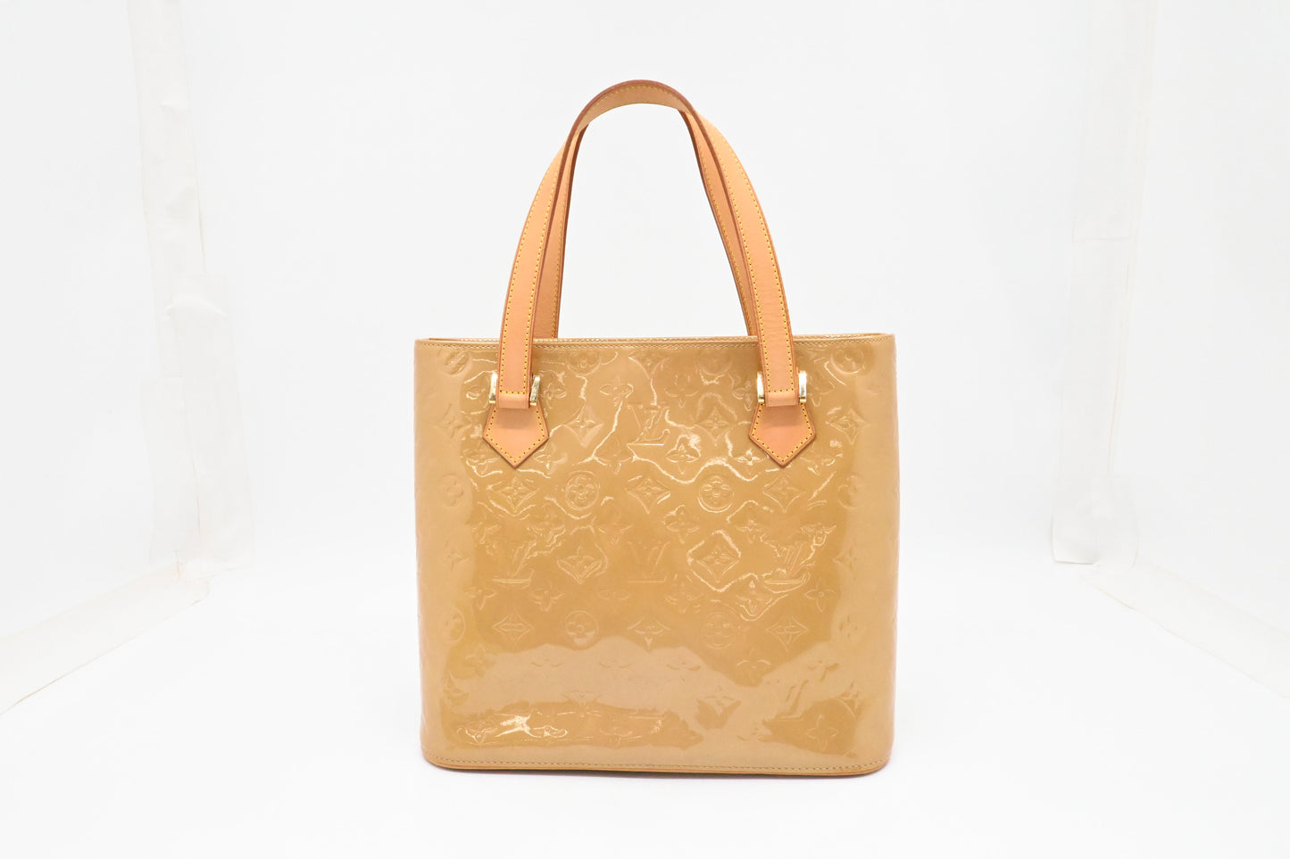 Louis Vuitton Houston in Beige Vernis Leather