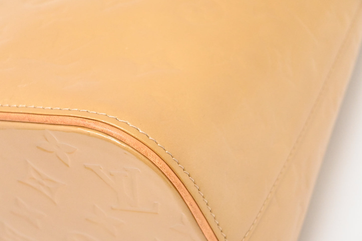 Louis Vuitton Houston in Beige Vernis Leather