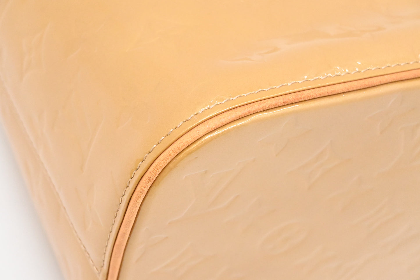 Louis Vuitton Houston in Beige Vernis Leather