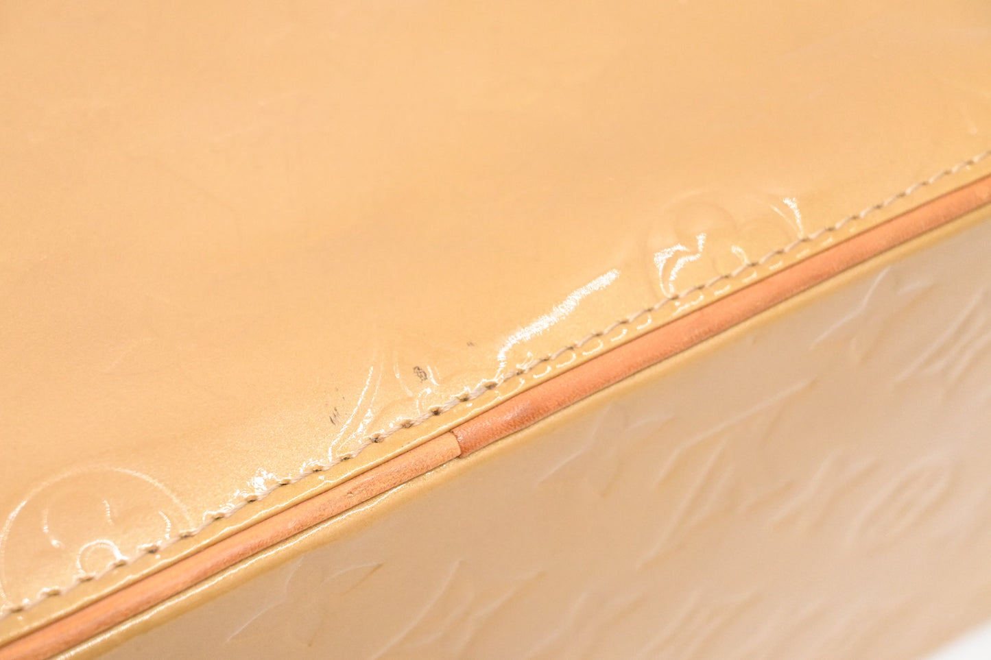Louis Vuitton Houston in Beige Vernis Leather