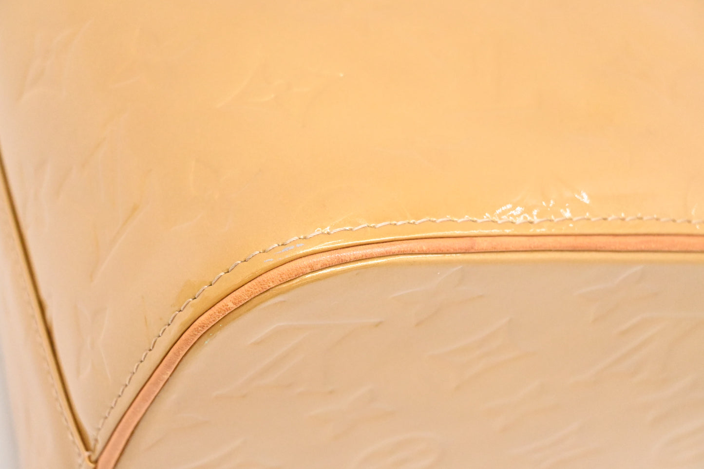 Louis Vuitton Houston in Beige Vernis Leather
