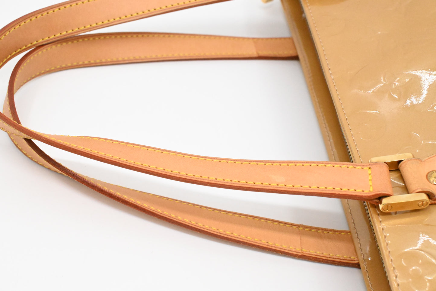 Louis Vuitton Houston in Beige Vernis Leather
