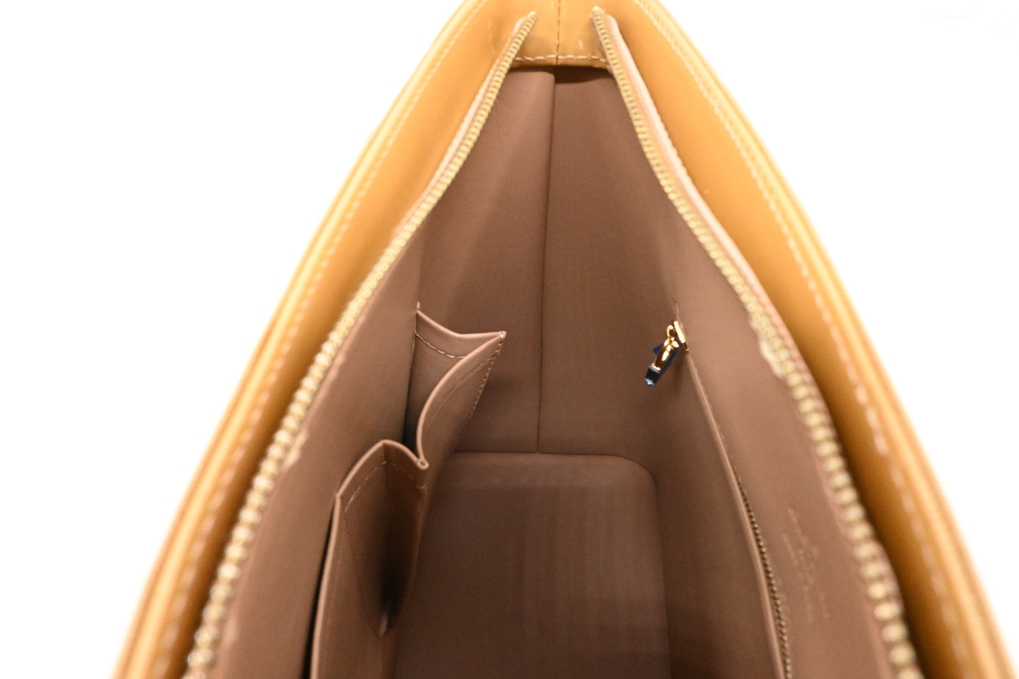 Louis Vuitton Houston in Beige Vernis Leather