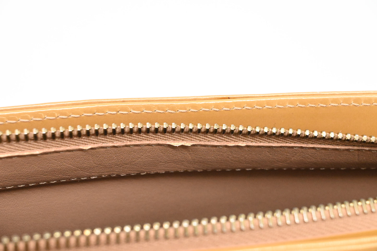 Louis Vuitton Houston in Beige Vernis Leather