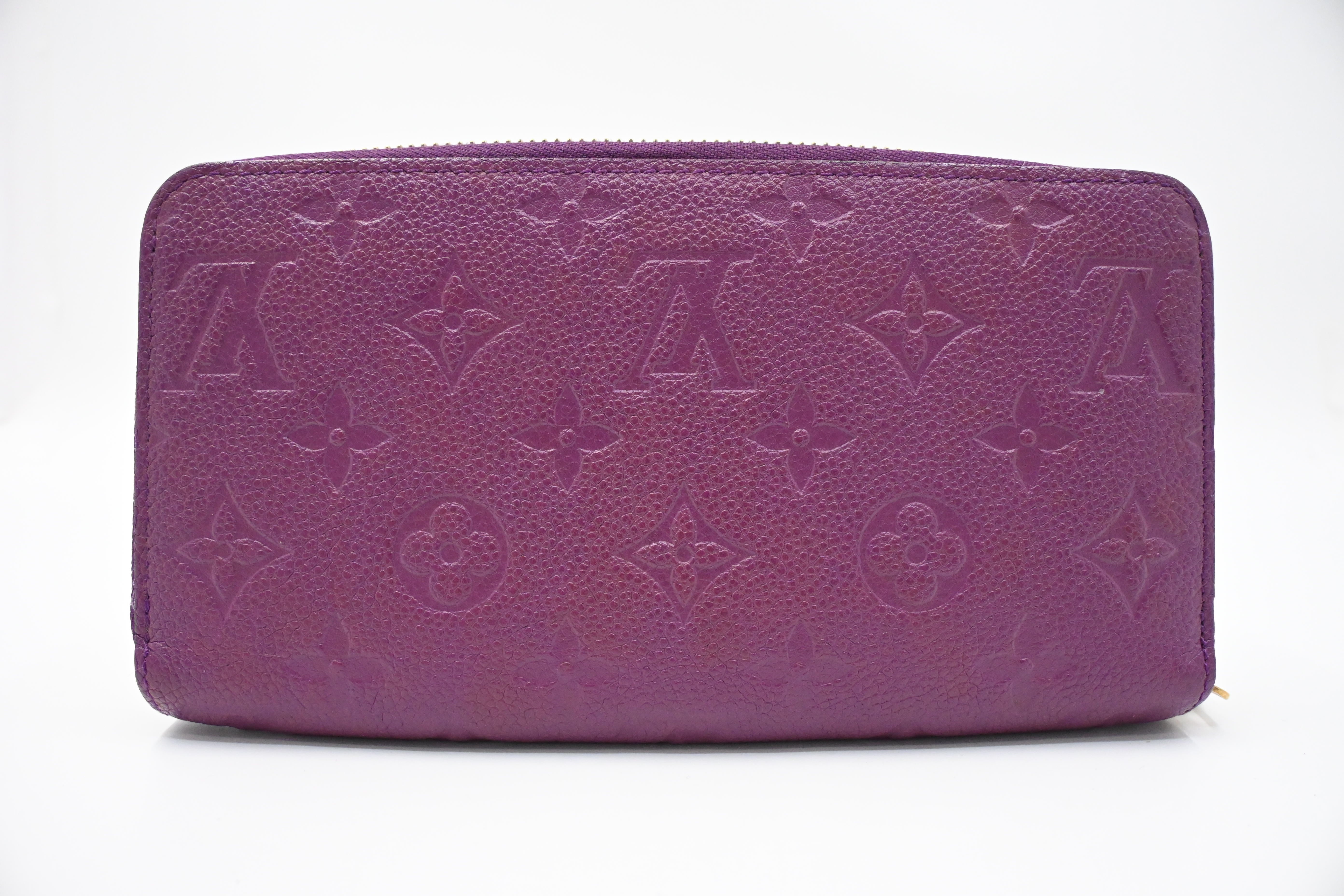パープルレザー製のLouis Vuittonシガーカッター Louis Vuitton Zippy Wallet in Purple Empreinte Leather – Weekly