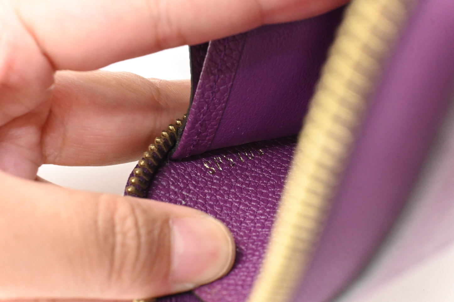 Louis Vuitton Zippy Wallet in Purple Empreinte Leather