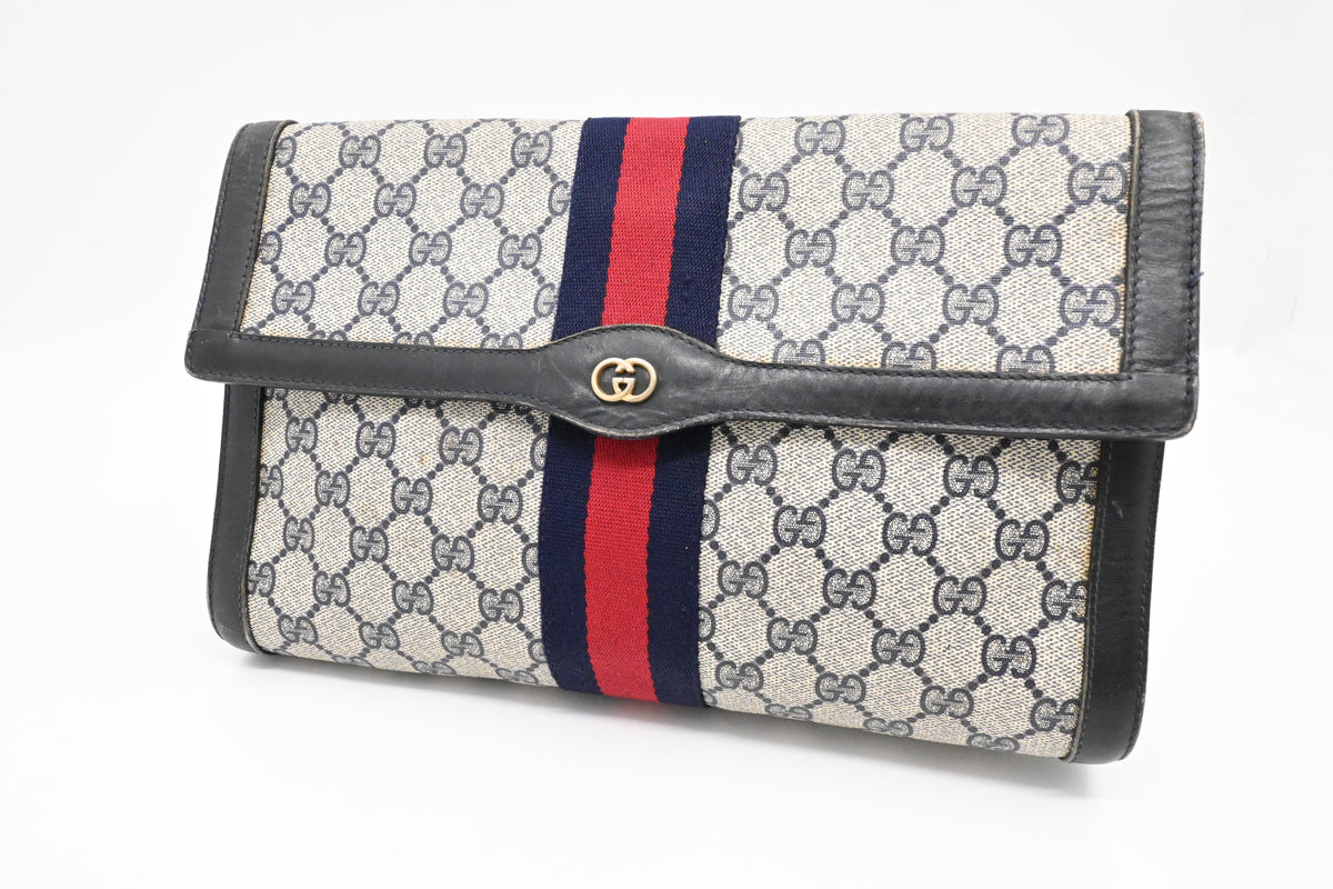 Gucci Clutch in Navy Blue GG Supreme Canvas