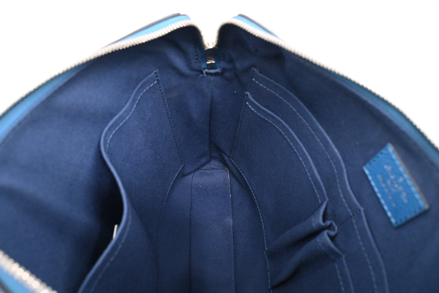 Louis Vuitton Grigori PM in Blue Taiga Leather